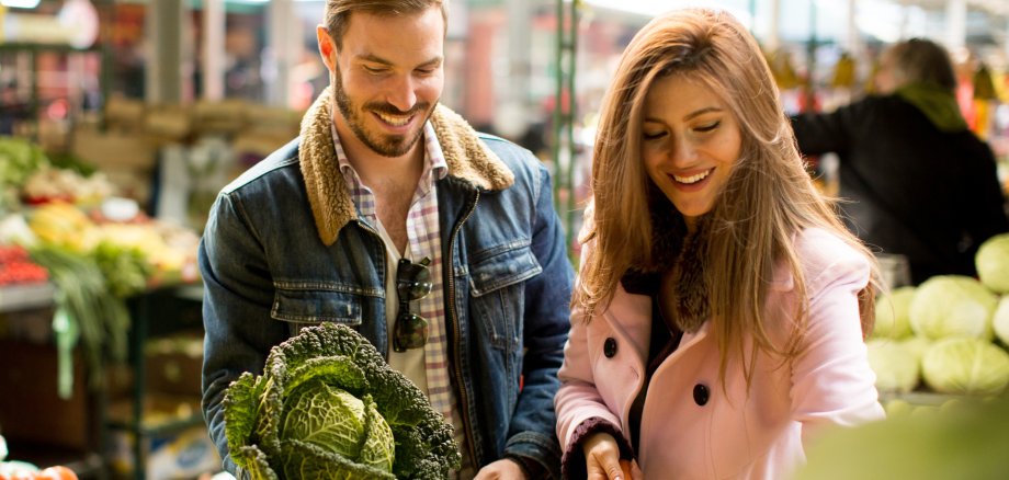 Couple at food market